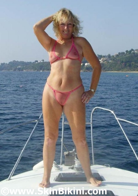 Sexy Kim is wearing skin bikini's see-thru bikinis and monokinis