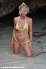 Leigh in one-string micro skin bikini